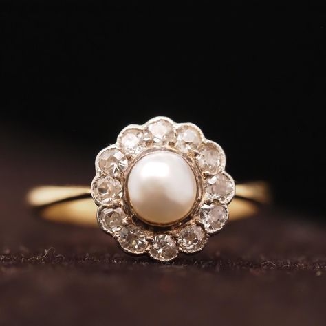 Year: Early 1900s Item Details: Ring Size: 6.75 Metal Type: [Hallmarked, and Tested] Weight: 3.0grams Diamond Details: Old European Brilliant, .25ct total weight, G Color, VS Clarity. Pearl Details: Natural Pearl, 5.5mm, Pinkish Luster Band Width: 2mm Condition: Excellent Edwardian Payment & Refund Details: More Pictures Available on Request Payment via Visa/Mastercard/Discover/AmericanExpress, check, money order or PayPal. Layaway * We will be more than happy to provide layaway payments for your convenience to make it easier to have the opportunity to enjoy one of our collection's treasure! Please contact us in advance so we can work out a payment plan best suited to your wants and needs. If you are able to visit us in our office and workshop located in Hicksville NY, please feel free to Edwardian Wedding Ring, Check Money, Pearl Rings Vintage, Edwardian Wedding, Edwardian Engagement Ring, Edwardian Ring, Money Order, Edwardian Jewelry, Pearl Details