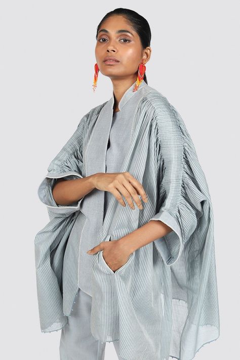 Shop Designer Women's Clothing & Accessories Online - Ensemble India  With fine pintucks and blanket stitch detailing, this oversized jacket in handwoven silk epitomizes luxe craftsmanship. A sophisticated and super stylish choice for all body types. Draped Jacket, Persian Fashion, Mode Kimono, Drape Jacket, Mode Boho, Outer Wear, Blanket Stitch, Oversized Jacket, Abayas Fashion