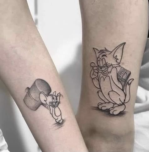 Brother An Sister Tattoos, Goofy Sibling Tattoos, Tom And Jerry Sibling Tattoos, Rare Hand Tattoos For Men, Matching Tom And Jerry Tattoos, Tom And Jerry Tattoo Ideas Matching, Tom And Jerry Couple Tattoo, Disney Sibling Tattoos, Tom E Jerry Tattoo