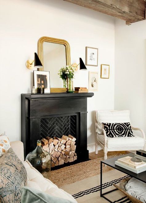 Faux fireplace idea in living room area + interior design #interiordesign #livingroom #fauxfireplace Black Fireplaces, Black Fireplace, House Details, Faux Fireplace, Mirror On The Wall, Fireplace Tile, Fireplace Mantle, Fireplace Design, Cozy Apartment