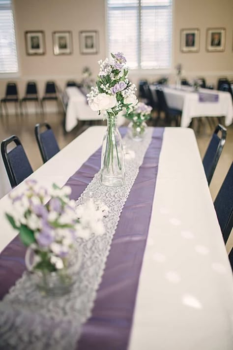 white and purple wedding decor Lavender And Sage Wedding Colors Wedding Ceremony Decor, Light Purple Wedding Decor, Lavender And Grey Wedding Theme, Purple Wedding Shower Ideas, Purple And White Wedding Decor, Lavender Wedding Theme Table Decorations, Lavender Wedding Table Decor, Church Tables, Lavender Wedding Decor