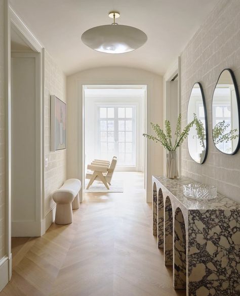 Design Eleven Co | The perfect home entry 😍 we love this mix of chevron floors and bold marble! Image via Pinterest | Instagram Parisian Chic Entryway, House Corridor Design Entryway, Parisian Apartment Entryway, Arched Hallway Ideas, Long Wide Hallway Ideas, Small Nook Ideas Hallways, Corridor Inspiration, Long Entryway, Contemporary Hallway