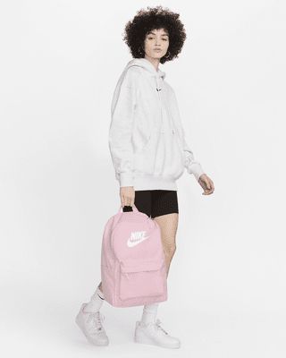 Take your gear to go with the Nike Heritage Backpack. Its spacious main compartment features a sleeve that holds up to a 15" laptop, so your computer is never out of reach. 2 zippered accessories pockets help keep your gear organized and easy to grab. This product is made with at least 65% recycled polyester fibers. Shown: Pink Foam/Pink Foam/White Style: DC4244-664 Nike Heritage Backpack, Gear Organizer, Out Of Reach, Heritage Backpack, Hold Ups, White Style, Laptop, Backpacks, Computer