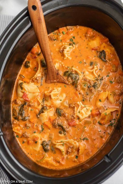 Crockpot Italian sausage tortellini soup recipe (& VIDEO!) Tortellini Soup Recipes Easy, Sausage Soup Crockpot, Tortellini Recipes Crockpot, Tortellini Soup Crockpot, Crockpot Italian Sausage, Sausage Crockpot Recipes, Italian Crockpot Recipes, Italian Sausage Tortellini Soup, Italian Sausage Tortellini