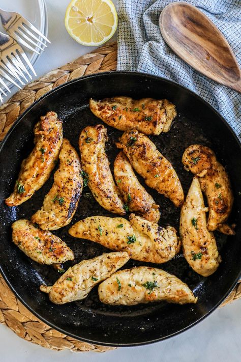 This SUPER yummy version of lemon pepper chicken tenders is a winner! Everyone loves a chicken tenderloin dinner recipe because they’re perfect for quick-cooking meals on busy weeknights. These homemade lemon pepper chicken strips are a fast, flavorful, easy one skillet recipe! It’s a chicken breast recipe that starts by seasoning and cooking slices, then tossing it in a rich lemon butter. The flavor is AMAZING, plus they’re a kid-friendly dinner that reheats perfectly as a lunch meal prep too. Lemon Pepper Chicken Tenders, Chicken Breast Strips Recipes, Easy Chicken Tenderloin Recipes, Chicken Tenders Dinner, Lemon Pepper Chicken Breast, Baked Chicken Cutlets, Chicken Strip Recipes, Chicken Tenderloin, Chicken Tenderloin Recipes