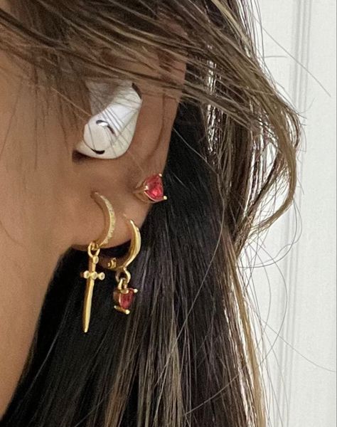 earrings ear piercing stack idea aesthetic gold earrings hoops dainty cute red triple ear Red Earring Stack, Red And Gold Jewelry Aesthetic, Red Earrings Aesthetic, Aesthetic Gold Earrings, Piercing Stack, Gold Earrings Hoops, 3 Ear Piercings, Gold Red Earrings, Ear Styling