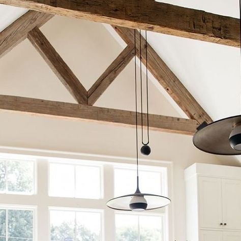 Troy Lighting on Instagram: "Exposed beams, vaulted ceilings, and our vintage-inspired Alchemy pendants 🌿⁠ Design: @lindsaytarquiniodesign⁠ .⁠ .⁠ .⁠ .⁠ #troylighting #pendants #kitchendesign #kitcheninspo #kitchengoals #kitchenlighting #kitchendesignideas #houseenvy #doingneutralright #cljsquad #interiordesign #interior #style #howyouhome #interiors123 #currentdesignsituation #howihome #home" Lighting Vaulted Ceiling, Vault Ceiling, Barrel Vault, Barrel Vault Ceiling, Troy Lighting, Vaulted Ceilings, Coach House, Exposed Beams, Cathedral Ceiling