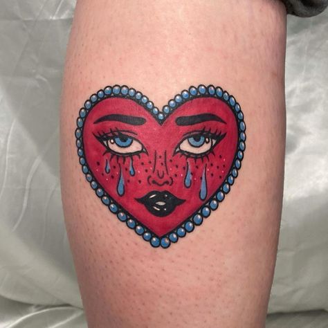 cool 23 Heart Tattoos for Lovers in 2021 Cute Red Heart Tattoo, Tattoos For Interior Designers, Love Heart Face Tattoo, Clown Heart Tattoo, Heart Tattoo With Face, Smiling Heart Tattoo, Cartoon Heart Tattoo, Heart Face Drawing, Heart With Eyes Tattoo