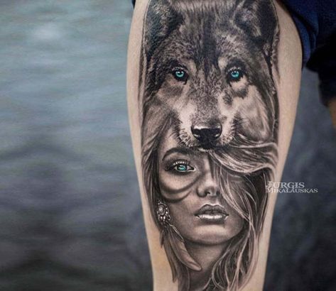 Pretty 2 colors realistic tattoo style of Wild girl with blue eyes, done by tattoo artist Jurgis Mikalauskas | Post 21053 | World Tattoo Gallery - Best place to Tattoo Arts Wolf Girl Tattoos, Indian Girl Tattoos, Wolf Tattoo Forearm, Tato Mata, Wolf Tattoos For Women, Wolf Sleeve, Headdress Tattoo, Girl With Blue Eyes, Realistisches Tattoo