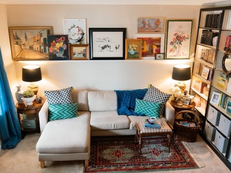 styling a picture ledge Eclectic Picture Ledge, Ikea Picture Ledges, Large Picture Ledge Layout, Wall To Wall Picture Ledge, Vintage Picture Ledge, Picture Ledge Styling Above Couch, Picture Ledge Above Desk, Floating Picture Ledge, Picture Ledge Over Couch