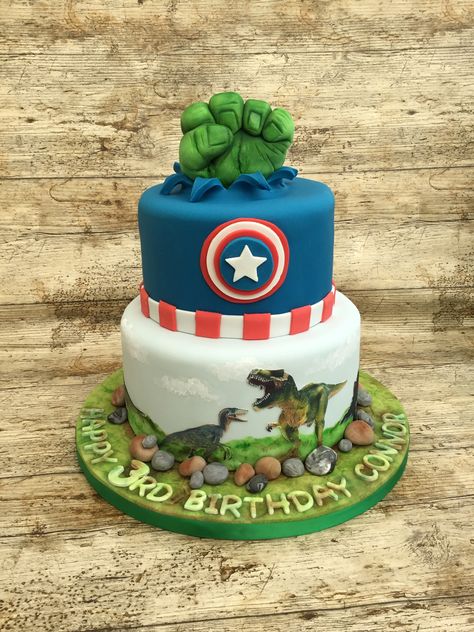 Hulk hand and dinosaur birthday cake by Sweet Sam’s Superhero Dinosaur Party, Dinosaur Superhero Cake, Superhero Dinosaur, Police Birthday Cakes, Auntie Things, Birthday Event Ideas, Police Cakes, Dinosaur Birthday Cake, Batman Birthday Cakes