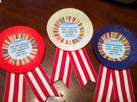 Fair ribbons for Anywhere Fun Fair Vbs Made out of cupcake liners, ribbon and Avery circle labels.  Hot glued together Circus Vbs Crafts, Carnival Crafts For Kids, County Fair Crafts, Carnival Vbs, Farm Vbs, Clown Decor, Carnival Activities, Fair Crafts, Happy Clown