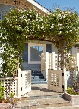 CURB APPEAL – another great example of beautiful design. Beach Cottage Renovation for Aging in Place with traditional entry in san francisco by Nancy Van Natta Associates. Cream Fence, Tor Design, Lattice Fence, Iron Gate Design, Front Yard Design, Cottage Renovation, Front Yard Fence, Stone Walkway, Front Gates