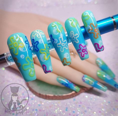 Hand painted acrylic press-on nails. Blue gradient nails with bubbles and flowers painted to mimic the skies in Bikini Bottom from Spongebob. Pictured are Long Coffins, Medium Squares. Package comes with 10 nails, 1 mini nail file, 1 plastic cuticle pusher, 2 alcohol pads, 1 nail oil pen, 1 tube of nail glue, and 1 sheet of adhesive nail stickers. Feel free to message me before ordering for minor changes to colors, design, etc! Physical product may differ slightly, as every set of nails I offer is lovingly handmade. I do my best to capture the best possible color quality in my photos, however, different monitors may slightly distort colors. No refunds. No returns due to hygiene reasons. However, if there is a issue, please contact me and I will work with you, to the best of my ability, to Fruity Pebble Nails, Costa Rica Inspired Nails, Rick Morty Nails, Acrylic Paint On Nails, Spongebob Flowers Nails, Two Color Nails Ideas, Spongebob Sky Nails, Pop Art Nail Art, Optical Illusion Nails