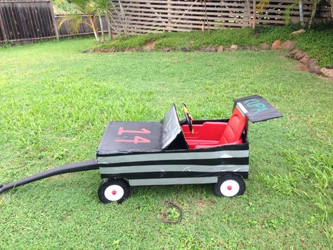 Race car wagon for Halloween Wagon Race Car Costume, Race Car Wagon Halloween, Halloween Wagon, Race Car Driver Halloween Costume, Kids Role Play, Kids Wagon, Role Play Costume, Toddler Classroom, Diy Halloween Costumes For Kids