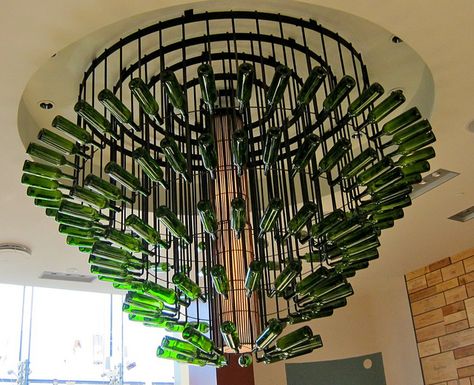 Awesome chandelier made of wine bottles. Quite fitting for Sonoma Wine Garden, don’t you think? Beer Bottle Chandelier, Wine Bottle Chandelier, How To Make A Chandelier, Chandelier Decorations, Paper Chandelier, Bottle Chandelier, Diy Beer, Recycled Wine Bottles, Empty Wine Bottles