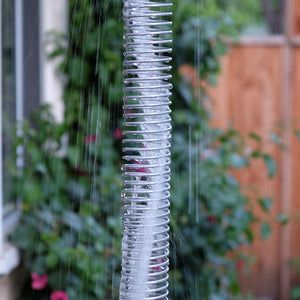 Rain Chains & Accessories | Handcrafted Downspout Alternatives Modern Rain Chains, How To Make A Rain Chain, Gutter Drainage, Backyard Drainage, Porch Wood, Rain Chains, Rain Chain, Rain Gutters, Rainwater Harvesting