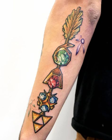 Legend of Zelda themed arrow for Lucas! Such a fun project and a rad idea, I had a great time tattooing this! Thanks for your endurance and… Legend Of Zelda Ocarina Of Time Tattoo, Zelda Ocarina Of Time Tattoo, Triforce Tattoo, Geeky Tattoos, Nintendo Tattoo, Illustrative Tattoo, Video Game Tattoos, Cosmic Tattoo, Nerdy Tattoos