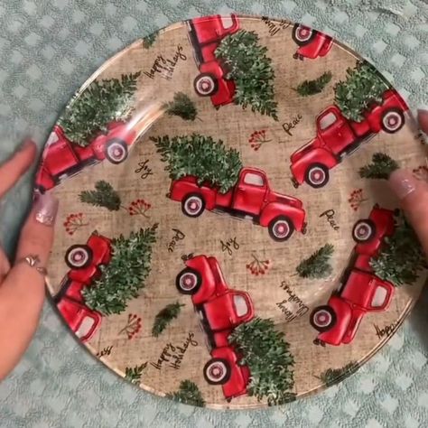 How to Decoupage Christmas Cookie Plates [Video] | Christmas crafts to make, Crafts, Fun christmas crafts Making Christmas Plates, Red Truck Crafts Diy, Fabric Plates Diy, Mogpog Crafts, Decoupage Christmas Plates, Mod Podge Plates With Fabric, Modge Podge Crafts For Kids, Decopauge Christmas Crafts, Clear Plate Crafts