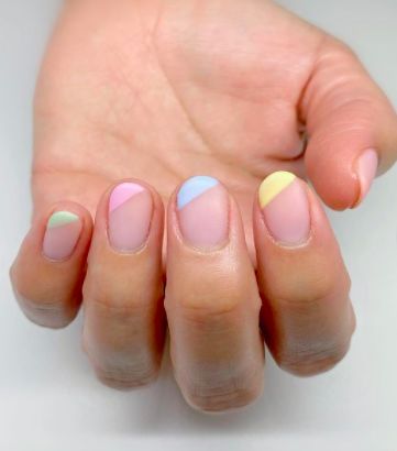 Easter Nails: Matte Diagonals. A pastel diagonal manicure with a matte finish. Click through for 30 Easter nail design ideas. #easternaildesigns #easternails #springnailideas #nailideas IG: @joymanicure Easter Nails Matte, Pastel French Tip Nails Almond Short, Multicolor French Tip Nails Pastel, French Manicure Pastel Tips, Rainbow Pastel French Nails, Easter Nail Designs French Tips Pastel Colors, Nail Inspo Pastel, Easy Easter Nails, Easter Color Nails