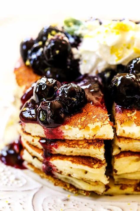 Lemon Ricotta Pancakes with Blueberry Sauce (Make Ahead & Freezer Instructions) Lemon Ricotta Pancakes Recipe, Pancakes Ricotta, Blueberry Ricotta Pancakes, Blueberry Ricotta, Maple Syrup Glaze, Lemon Ricotta Pancakes, Ricotta Pancakes, Carlsbad Cravings, Ricotta Recipes