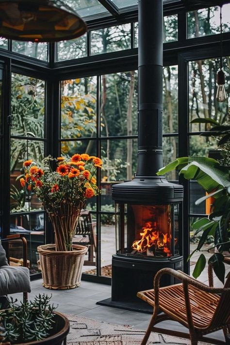 Cozy Sunroom Fireplace Ideas for a Warm Retreat Green House With Fireplace, All Season Room With Fireplace, Solarium With Fireplace, Sunroom With Jacuzzi, Interior Design Sunroom, Sunroom Fireplace Ideas, Small Sunroom Decorating Ideas Indoor, Fireplace In Sunroom, Moody Sunroom