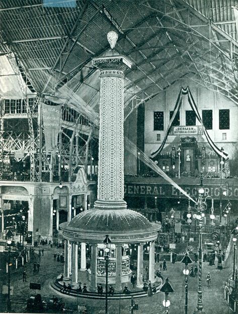 Edison Tower of Light - "A tall shaft extending almost to the roof, with a colonnade about its base, the whole studded with miniature incandescent lamps arranged in geometrical figures and in red, orange, and purple." Columbian Exposition 1893, World's Columbian Exposition, World Fair, Chicago History, Worlds Fair, Chicago City, White City, World's Fair, Love Letter