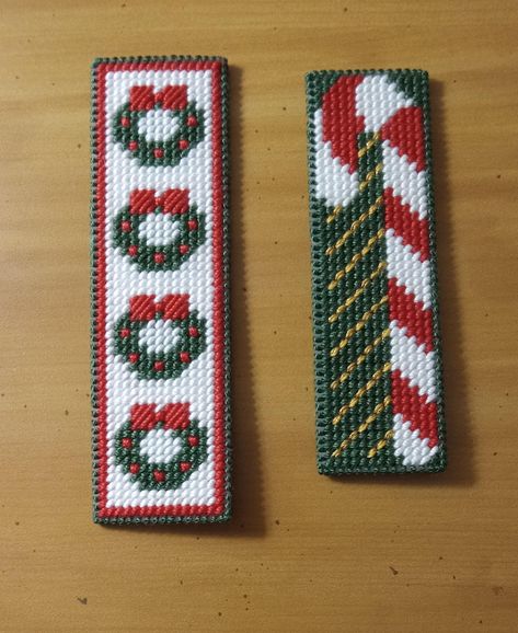 Set of 2 Christmas bookmarks. 1 wreath and 1 candy cane. The background on the wreath bookmark is white.  The wreath bookmark is approximately 5.5 x 1.5 inches and the candy cane bookmark is approximately 4.75 x 1.5 inches. These are made with plastic canvas, yarn and felt. Comes from a smoke free home. Shipping to the continental United States only. Christmas Plastic Canvas Patterns Free, Plastic Canvas Alphabet, Plastic Canvas Bookmarks, Plastic Canvas Bookmark, Canvas Bookmarks, Bookmarks Christmas, Making Bookmarks, Bookmark Pattern, Plastic Craft