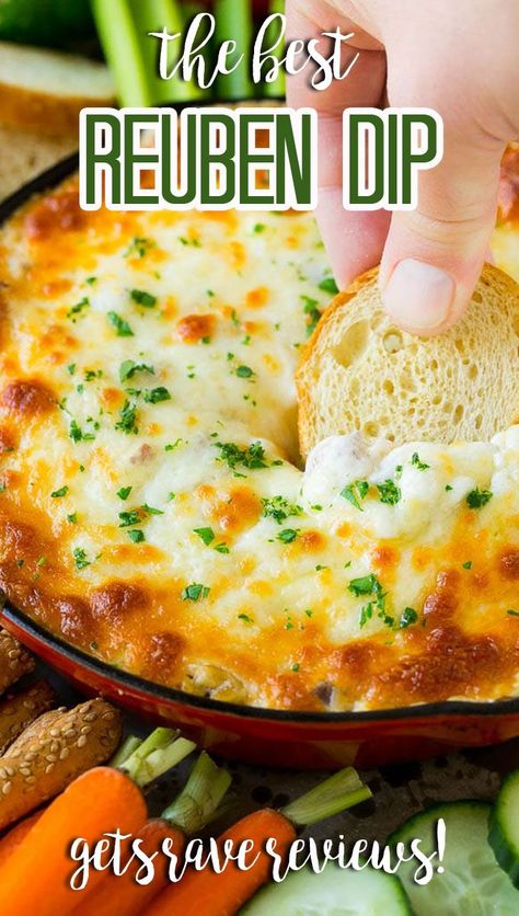 This Reuben dip is a hot cheesy dip made with the classic sandwich ingredients including corned beef, sauerkraut and Thousand Island dressing. Baked Reuben Dip, Corned Beef Dip Appetizers, Sauerkraut Dip Recipes, Sauerkraut Appetizer Recipes, Corned Beef Appetizer Recipes, Sauerkraut Appetizers, Corn Beef Dip, Sauerkraut Dip, Reuben Squares