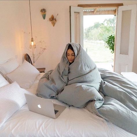 A Woman, Laptop, Computer, Pillows, Bed, White