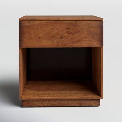 Organic in nature with mid-century undertones. Solid acacia forms a streamlined nightstand, with a single drawer plus lower shelving for handy bedside storage. | Birch Lane™ Mullane 1 - Drawer Solid Wood Nightstand in 23.0 H x 22.0 W x 18.0 D in brownWood in Burnt Fruitwood | 23" H X 22" W X 18" D | Wayfair Bedside Storage, Long Lumbar Pillow, Lulu And Georgia, Outdoor Furniture Collections, Wood Nightstand, Outdoor Dining Furniture, Dining Room Bench, Open Shelf, Furniture Dining Table