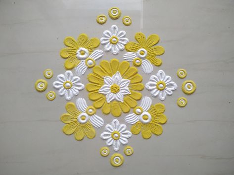 Quick and beautiful rangoli using white and yellow color. #FloorDecoration #SandArt #RangoliDesign #ShradzHappyPlace Yellow And White Rangoli, Yellow Rangoli, Rangoli Making, Colour Rangoli, Rangoli Colours, Floor Decoration, Colorful Rangoli, Daily Rangoli, Simple Rangoli Designs Images