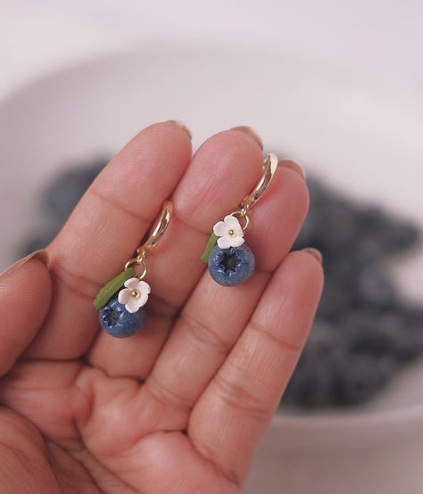 Miniature magic! ✨ These blueberry earrings are like tiny pieces of summer sky. Handcrafted with love and polymer clay, each one is unique. They’re the perfect pop of color for your everyday look or a fun night out. Trust me, you’ll be berry obsessed! 🫐💜 Alex Johnson, Blueberry Earrings, Summer Sky, Pop Of Color, Trust Me, Polymer Clay Earrings, Clay Earrings, Everyday Look, With Love