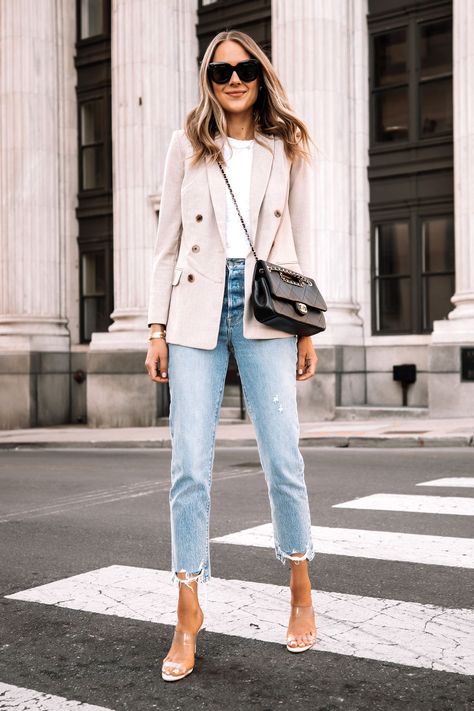 Fashion Jackson Wearing Express Beige Blazer Outfit White Tshirt Ripped Jeans Clear Sandal Heels Street Style Beige Blazer Jeans Outfit, Business Denim Outfits, Clear Heels Outfit Jeans, Clear Sandals Outfit, Blazer And Heels Outfit, How To Style A Blazer With Jeans, Chanel Blazer Outfit, Jeans And Blazer Outfit, Cream Blazer Outfit