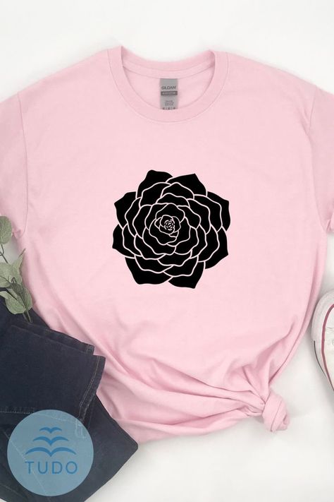 Light Pink Shirt with a black rose design in the middle of the shirt. It is a 2D rose design. The design is made with heat transfer vinyl. Floral Tees, Rose Tshirt, Nature Clothing, Floral Tshirt, Rose Graphic, Iron Design, Rose Shirts, Church Graphic Design, Rose T Shirt