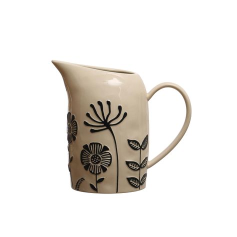 PRICES MAY VARY. Add a touch of elegance to the table with this hand-painted stoneware pitcher featuring beautiful embossed flowers and a cream color with black accents The hand-painted design and intricate detailing make this pitcher a stylish addition to various styles, including farmhouse, traditional, and vintage With a capacity of 62 ounces, this pitcher is perfect for serving any favorite beverages, such as lemonade, iced tea, or sangria, also ideal for holding fresh flowers, adding a char Painted Pitcher, Stoneware Pitcher, Drink Pitcher, Hand Painted Plates, Serving Drinks, Creative Co Op, Beige And Black, Kitchen Collection, Black Hand