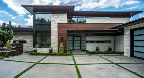 Nice colour scheme. Grey stone, dark roof and dark brown panels (wood grain aluminum siding) Passive Homes, Exterior Facelift, Prairie Modern, Rustic Staircase, Contemporary House Exterior, Contemporary Exterior, Modern Addition, Modern Architecture House, Stained Wood