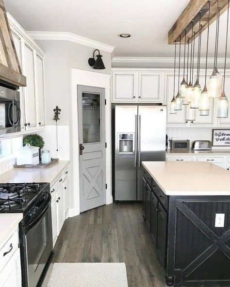 Farmhouse Is My Style on Instagram: “Distressed black farmhouse kitchen island and a complimentary gray pantry door. And oh that lighting! Industrial modern farmhouse style.…” Corner Pantry, Farmhouse Kitchen Cabinets, Farmhouse Kitchen Design, Pantry Door, Farmhouse Style Kitchen, Modern Farmhouse Kitchens, Trendy Kitchen, Kitchen On A Budget, Large Kitchen