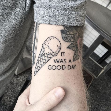 Black tattoo of an ice cream cone and a quote ‘it was a good day’ inked on the left arm Ice Cream Cone Tattoo, Cliche Tattoo, Cone Tattoo, Ice Cream Tattoo, Pikachu Tattoo, Cream Tattoo, Tattoo On Hand, Inner Arm Tattoo, Star Tattoo Designs