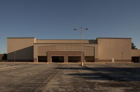 This is the exterior of the Metro North Shopping Center in Kansas City, Missouri. Abandoned Mall Exterior, Abandoned Shopping Center, Abandoned Mall, Abandoned Malls, Dead Malls, Space Aesthetic, Haunting Photos, Bg Design, Abandoned Castles