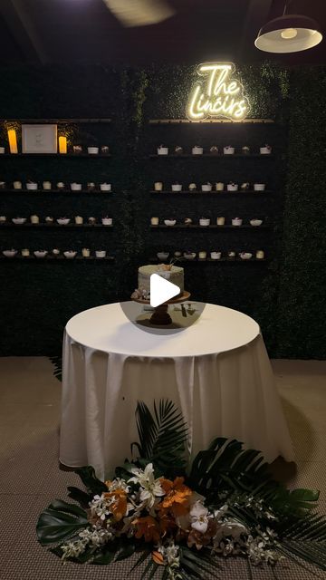 Tori Rogers on Instagram: "Trifecta wedding tip… Maximize your investment, create an interactive element,  and transform your space at the same time. 

These topiary walls camouflage an ugly bookshelf wall and completely transform this space. 

Shelves are added to host glass flutes of champagne or sparkling cider that guests take on their way to their assigned seats at the dining table. 

Like magic, mini-desserts in a glass jar appear on the wall for guests to take at their leisure. 

A wise investment and wedding budget expense that impressed the guests and created a beautiful aesthetic. 

PHOTOGRAPHER  Colby & Jess @colbyandjess
VENUE  Maui Eldorado
VIDEOGRAPHER @skinandbonescinema
HAIR & MAKEUP @mauimakeupartistry
CATERING & BAR  Nicole Scharer Events @nicolescharerevents
RENTALS @let Bookshelf Wall, Desserts In A Glass, Budget Expenses, Sparkling Cider, Wedding Budget, Wall Bookshelves, Beautiful Aesthetic, Flute Glass, Hawaiian Islands