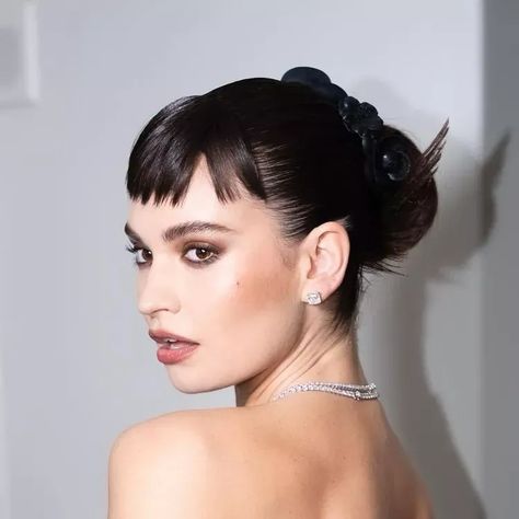 Audrey Hepburn Bangs, Audrey Hepburn Pixie, Audrey Hepburn Hair, Bangs Updo, Black Hair Bun, Audrey Hepburn Inspired, Slicked Back Ponytail, Classic Glamour, Baby Bangs