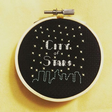 City of Stars cross stitch hoop (based on the movie La La Land) Instagram.com/sweetpeachdesignco https://www.craftsy.com/profile/sweet-peach-designs La La Land Gift Ideas, La La Land Art, Stars Cross Stitch, Movie Embroidery, City Of Stars, Sew Ideas, Cross Stitch Hoop, Pretty Embroidery, Star Cross