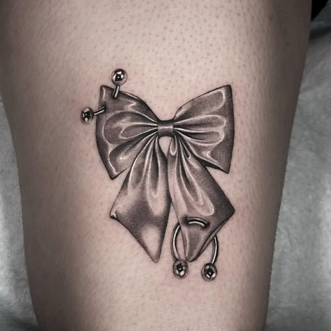 Pierced satin bow from my flash ! Thanks so much 🎀⛓️ #pdxtattoo #chrometattoo #bowtattoo | Instagram Gothic Garter Tattoo, 90s Tattoos Grunge, Cute Bow Tattoos Girly, Bow Tattoo Back Of Arm, Stomach Cover Up Tattoos, Vampy Tattoo, Gothic Bow Tattoo, Spikey Tattoos, Cowbell Tattoo