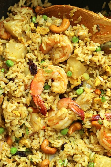 This authentic better-than-takeout Thai Pineapple Fried Rice is the perfect savory/sweet recipe to satisfy your cravings. Adding succulent shrimp to this colorful concoction provides a boost of protein and tons of flavor. Chinese Porridge, Pineapple Shrimp Fried Rice, Pineapple Rice Recipes, Rice And Shrimp, Fried Rice With Shrimp, Thai Pineapple Fried Rice, Rice With Shrimp, Fry Rice, Pineapple Shrimp