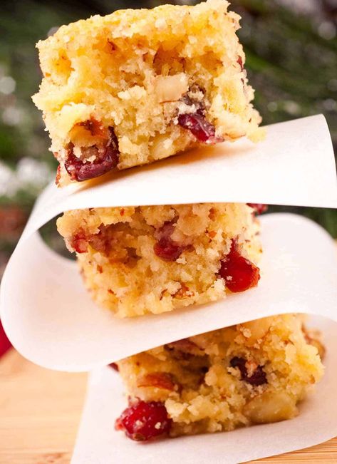 Easy-to-make, buttery blondies flavored with orange juice, orange zest, dried cranberries and slivered almonds. #baking #recipe #dessert #recipe Orange Bars, Dried Cranberry, Cranberry Bars, Baked Apple Recipes, Light Desserts, Bar Recipes, Cranberry Orange, Bars Recipe, Orange Recipes