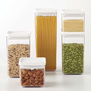 Enjoy free shipping on all purchases over $75 and free in-store pickup on the 5-Piece White Modular Canister Set at The Container Store. There's a simple way to tackle kitchen and pantry organization. This canister set includes five popular sizes for your most-used dry ingredients. Each food storage container is clear so contents can be checked at a glance; never run low on flour, pasta, cereal or sugar again. Custom-fit lids preserve freshness. Because everything is stackable, these modular ... Clear Storage Containers, Plastic Kitchen Cabinets, Storage Containers Kitchen, Clutter Free Kitchen, Food Canisters, Style Pantry, Clear Storage, Pantry Ideas, Countertop Storage