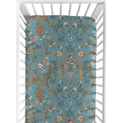 Boho floral wildflower fitted crib sheets will help complete the look of your Sweet Jojo Designs nursery. This multicolor wildflower print brushed microfiber sheet fits all standard crib and toddler mattresses and is machine washable for easy care. Color: Turquoise/Orange/Coral | Boho Floral Wildflower Fitted Crib Sheet by Sweet Jojo Designs, Microfiber in Blue | 52 H x 28 W in | Wayfair Maximalist Nursery, Hippie Nursery, Turquoise Nursery, Teal Nursery, Wildflower Nursery, Baby Toddler Bed, Moon Pies, Baby Crib Bedding Sets, Paisley Flower