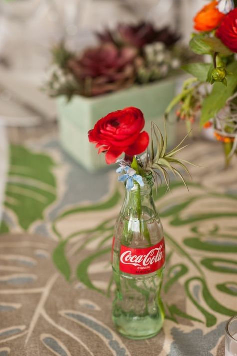 Coke Bottle Planters, Coke Crate Ideas, Glass Coke Bottles, Coca Cola Party, Turned Vase, Wedding Snap, Blue By Enzoani, Mexican Party Decorations, Bottle Centerpieces