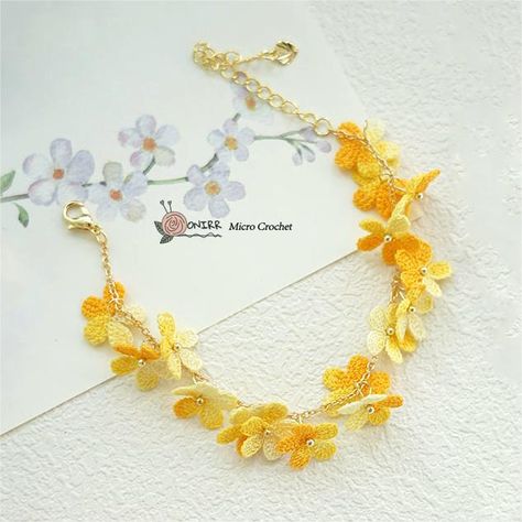 Onirr Micro Crochet Yellow-Orange Flower Bracelet This color is too beautiful, right? Wearing this bracelet will makes you feel happy every day. You can buy it in our store——onirr.com ----------------------------------------------------------------------------- #gift #handmadecrafts #crochet #crocheting #handmadegifts #mothersdaygift #gifts #handmade #microcrochet #DIYGifts #bracelet Crochet Beaded Bracelets, Coral And Gold, Crochet Flower Tutorial, Crochet Bracelet, Mothersday Gifts, Flower Bracelet, Earring Sale, Bead Crochet, Orange Flowers